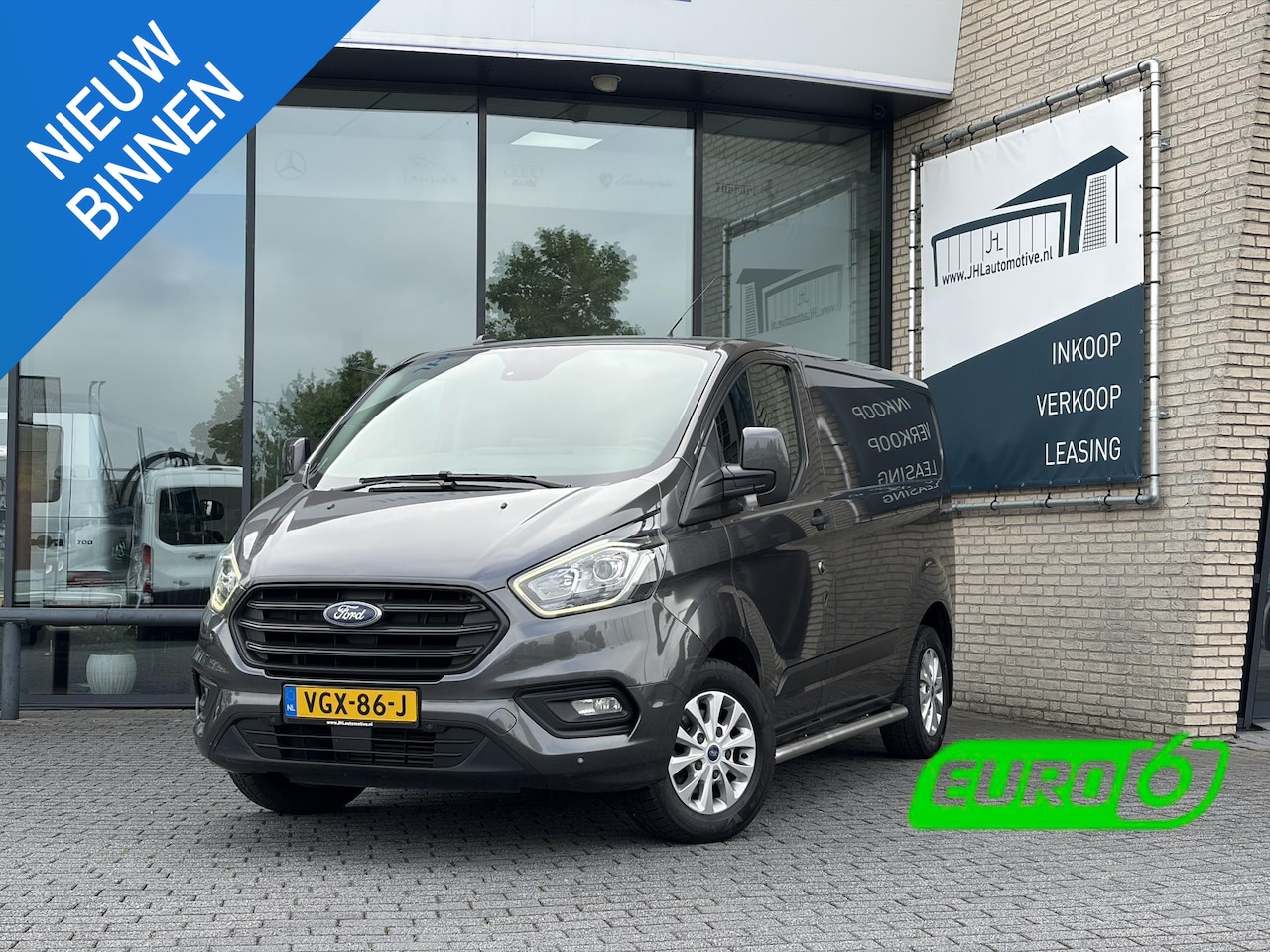 Ford Transit Custom - 320 2.0 TDCI L1H1*HAAK*CAM*NAVI*LEDER*AUTOMAAT* - AutoWereld.nl