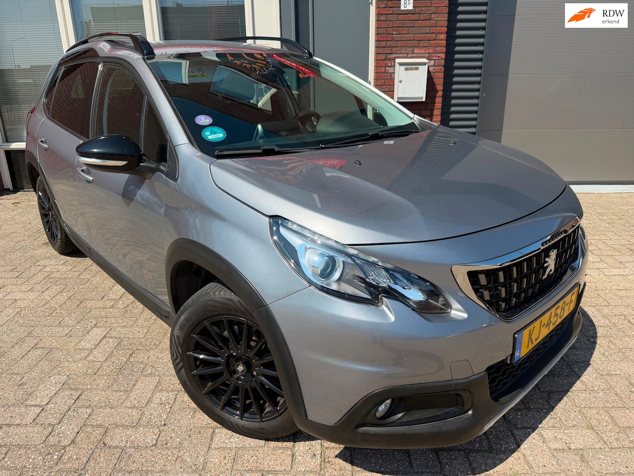 Peugeot 2008 - 1.2 PureTech GT-line / Leder / PDC / Navi / Cruise / Clima - AutoWereld.nl