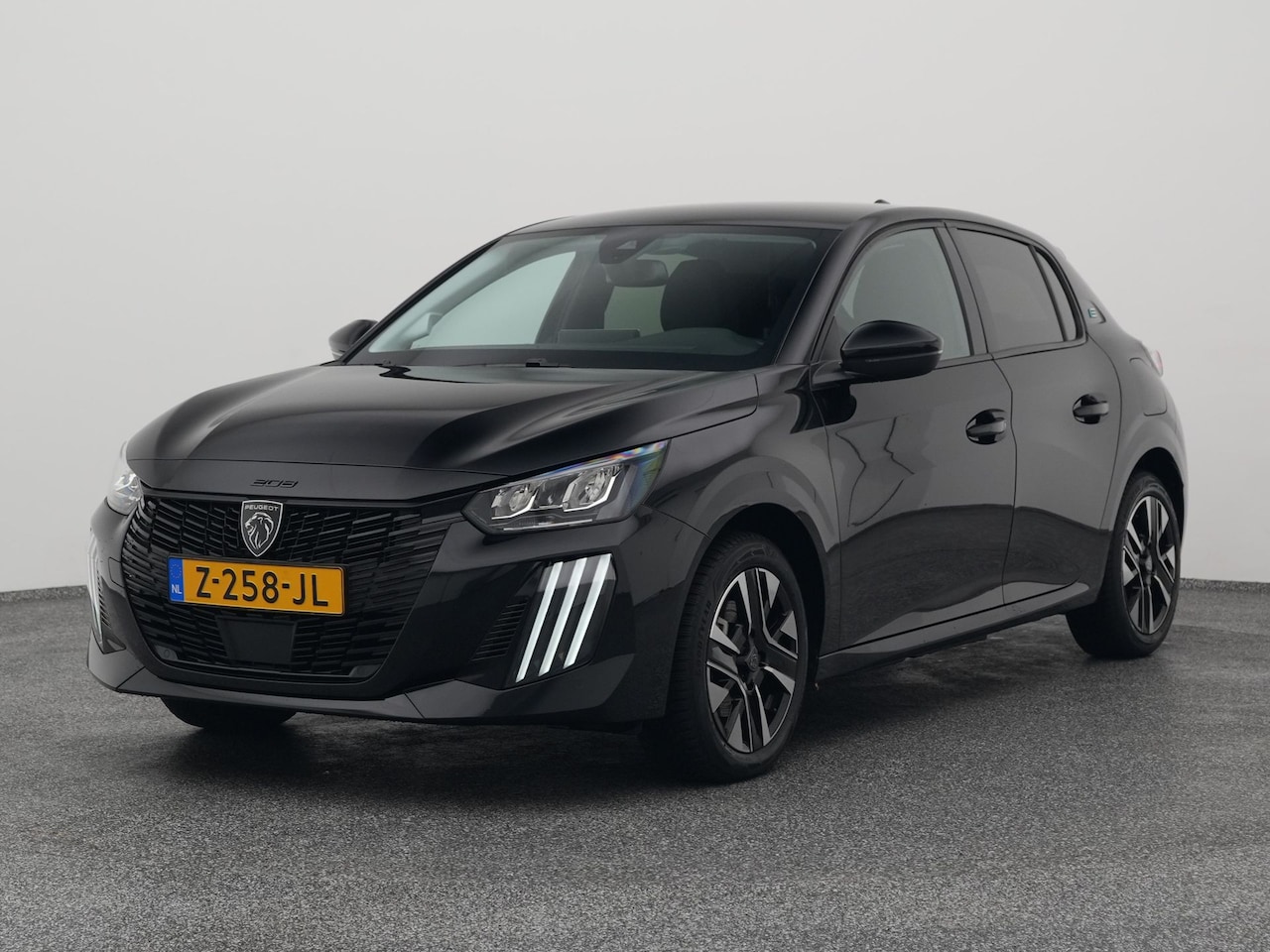Peugeot e-208 - EV Allure 51 kWh | NAVI | STOELVERWARMING - AutoWereld.nl