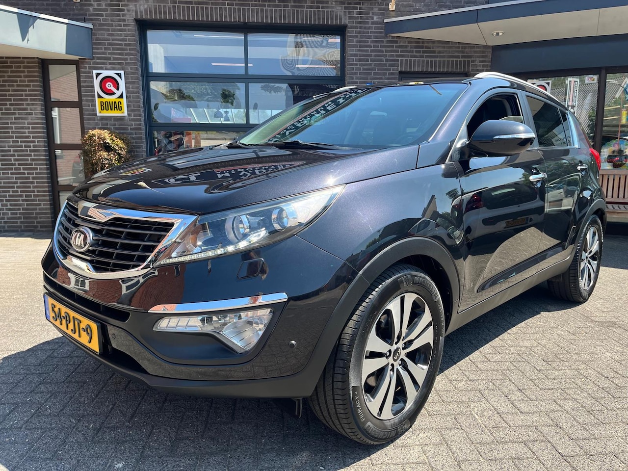Kia Sportage - 2.0 CVVT 2WD AUTOMAAT - AutoWereld.nl