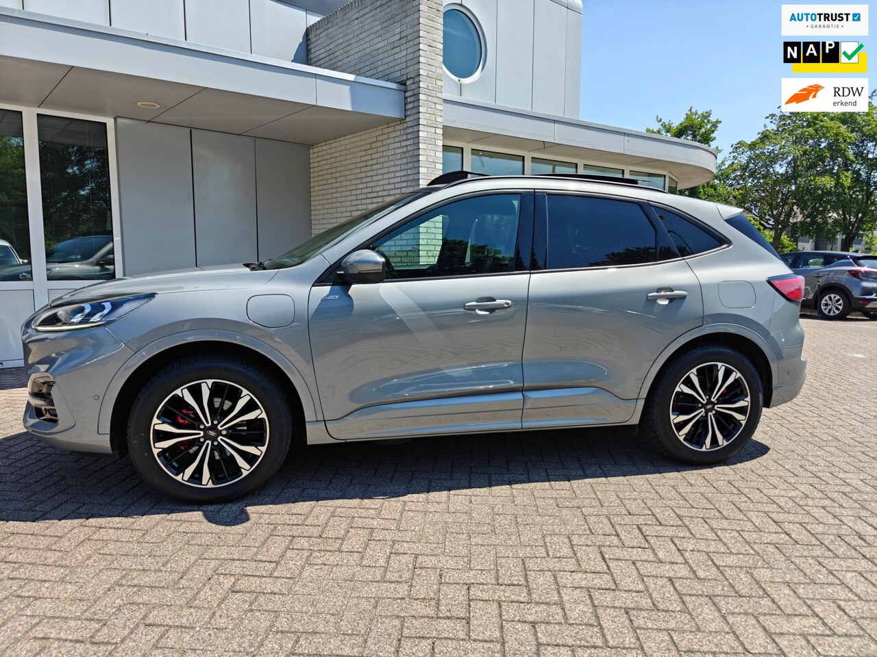 Ford Kuga - 2.5 PHEV ST-Line X / Panoramadak / Winterpakket / Head Up / Trekhaak! - AutoWereld.nl