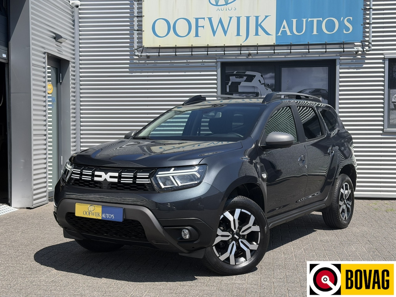 Dacia Duster - 1.3 TCe 150 Journey Automaat Clima Navi 360 Camera CarPlay - AutoWereld.nl