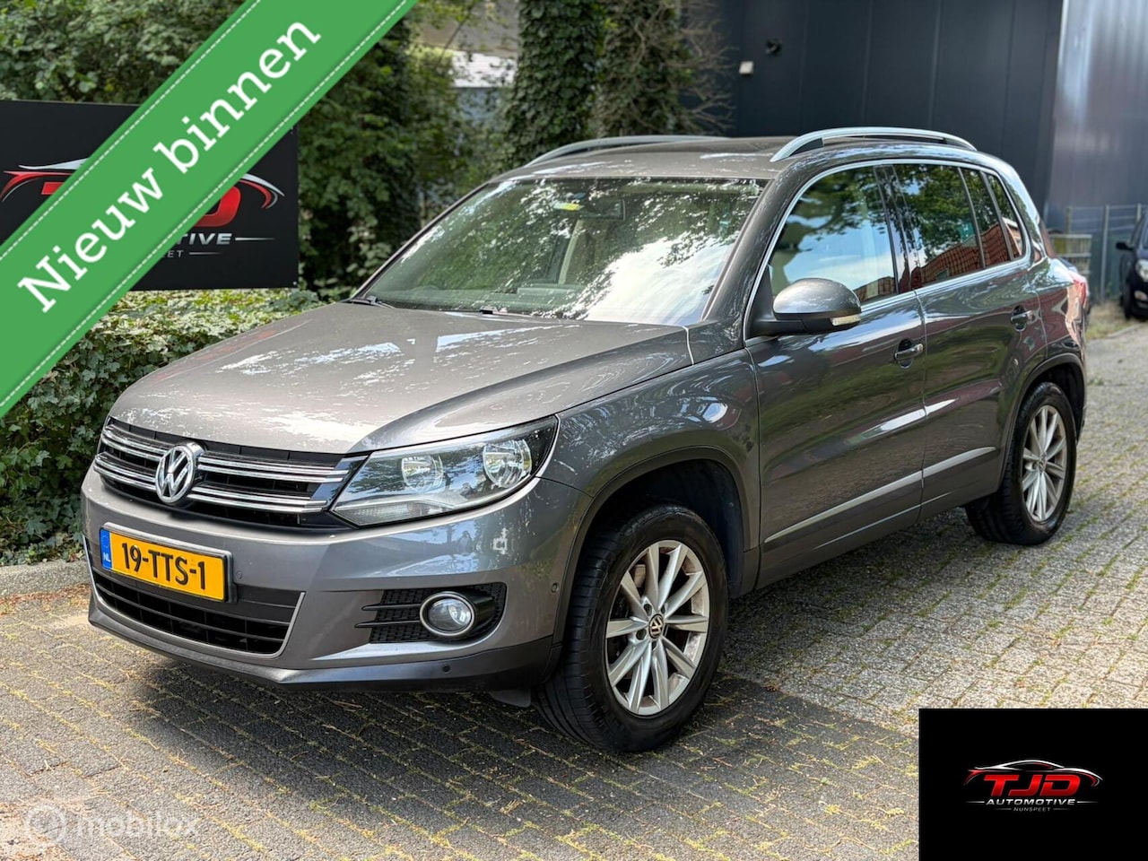 Volkswagen Tiguan - 1.4 TSI Sport&Style LEDER-PANO-CRUISE-NAP - AutoWereld.nl