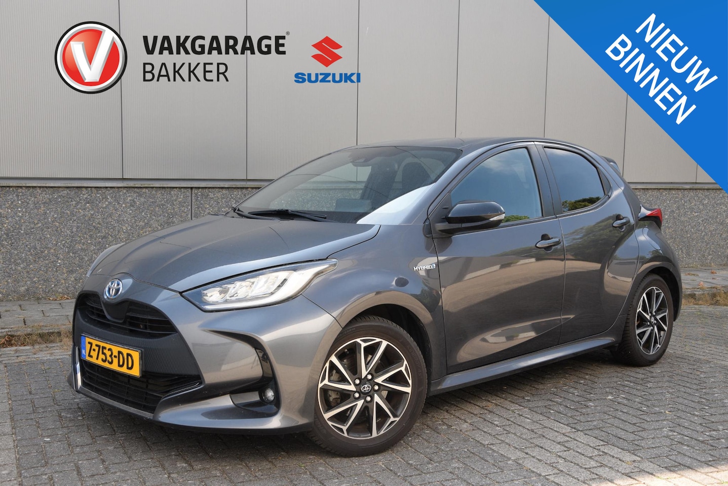 Toyota Yaris - 1.5 Hybrid Executive | Stuurverwarming | Trekhaak | Stof/-lederen bekleding | - AutoWereld.nl