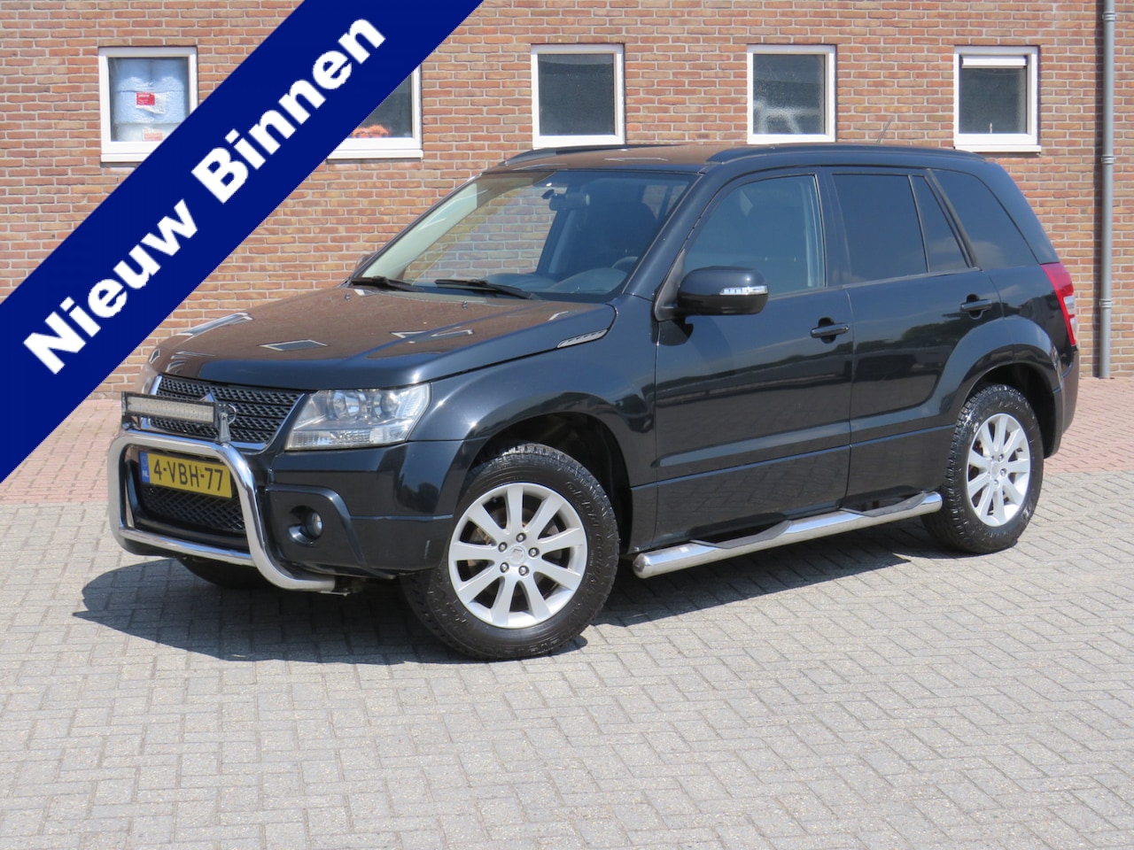 Suzuki Grand Vitara - 1.9 Exclusive VAN 4x4 Grijs Kenteken * Trekhaak * Climate Control * Lichtmetalen velgen * - AutoWereld.nl