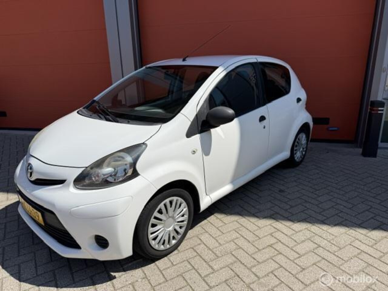 Toyota Aygo - 1.0 VVT-i Now 5DRS 134.000 KM NAP-AIRCO-APK 2027 - AutoWereld.nl
