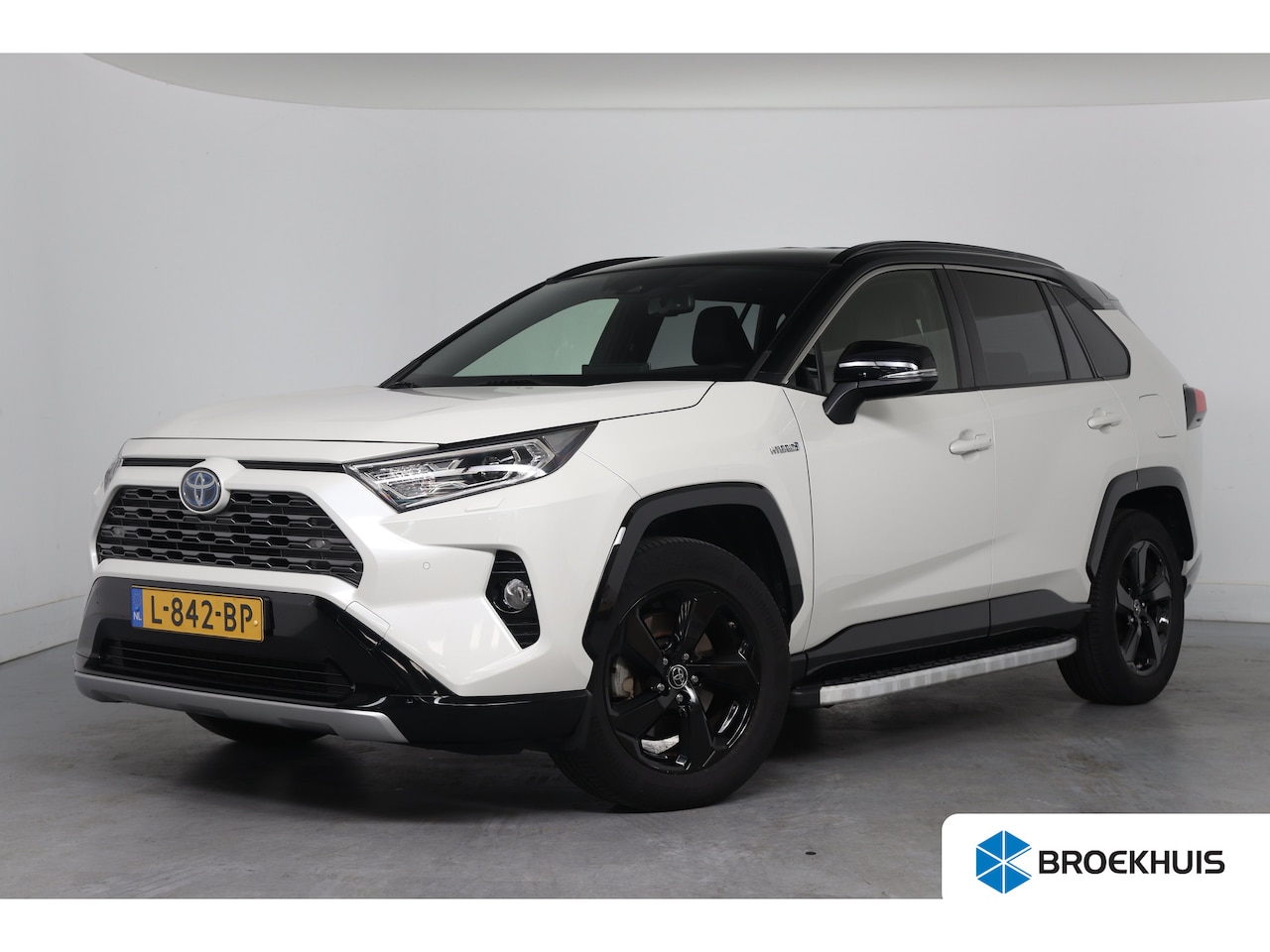 Toyota RAV4 - 2.5 Hybrid AWD Bi-Tone | Dealer Onderhouden! | Stoel/stuurverwarming | Navi | Clima | Came - AutoWereld.nl