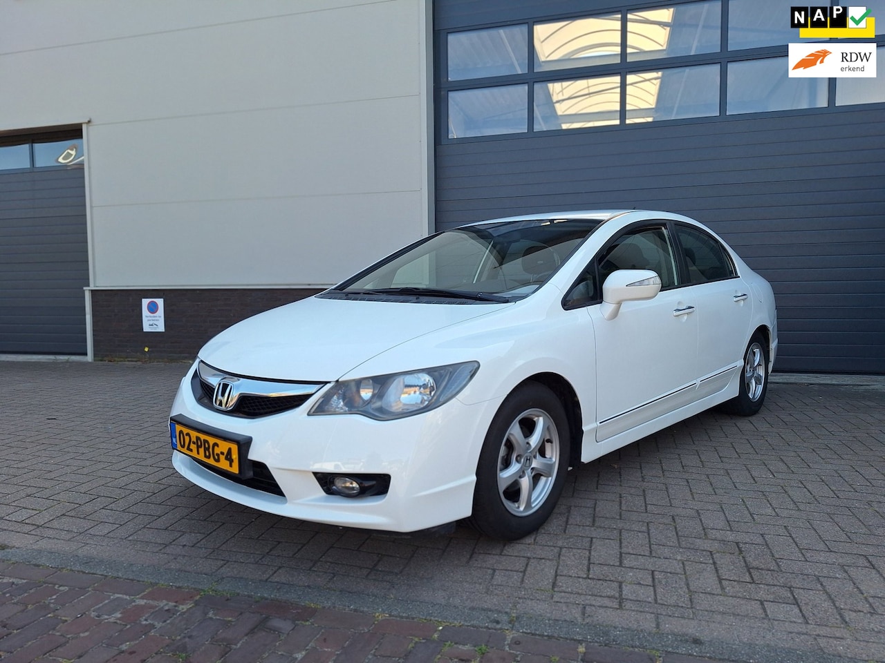 Honda Civic - | 1.3 Hybrid Elegance | Lage kilometerstand | Airco | Stoel verwarming | Cruise control | - AutoWereld.nl