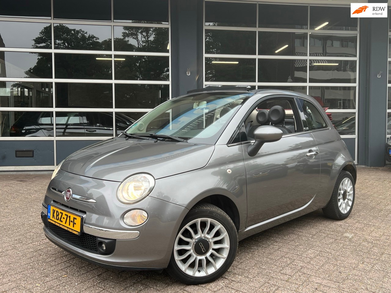 Fiat 500 - 1.2 Lounge *CABRIO*AIRCO*ELEKTR. RAMEN*PDC*STUURBEKR.*LM. VELGEN* - AutoWereld.nl