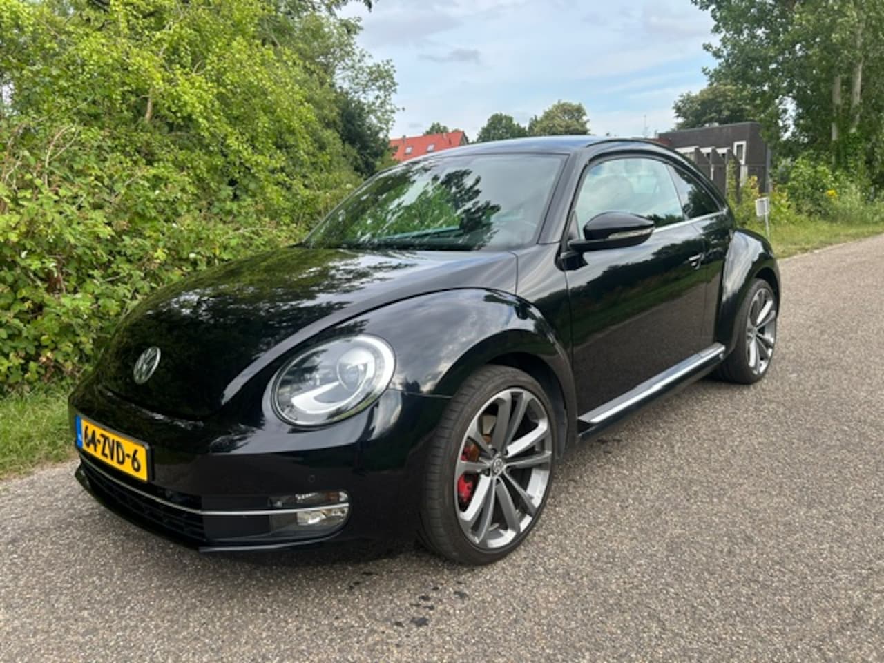 Volkswagen Beetle - 2.0 TSI Sport DSG en leder - AutoWereld.nl