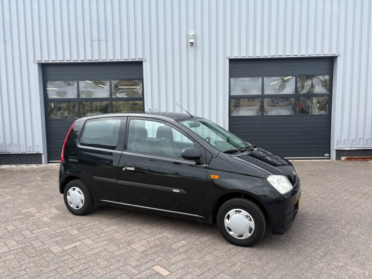 Daihatsu Cuore - 1.0-12V Ozaka - AutoWereld.nl