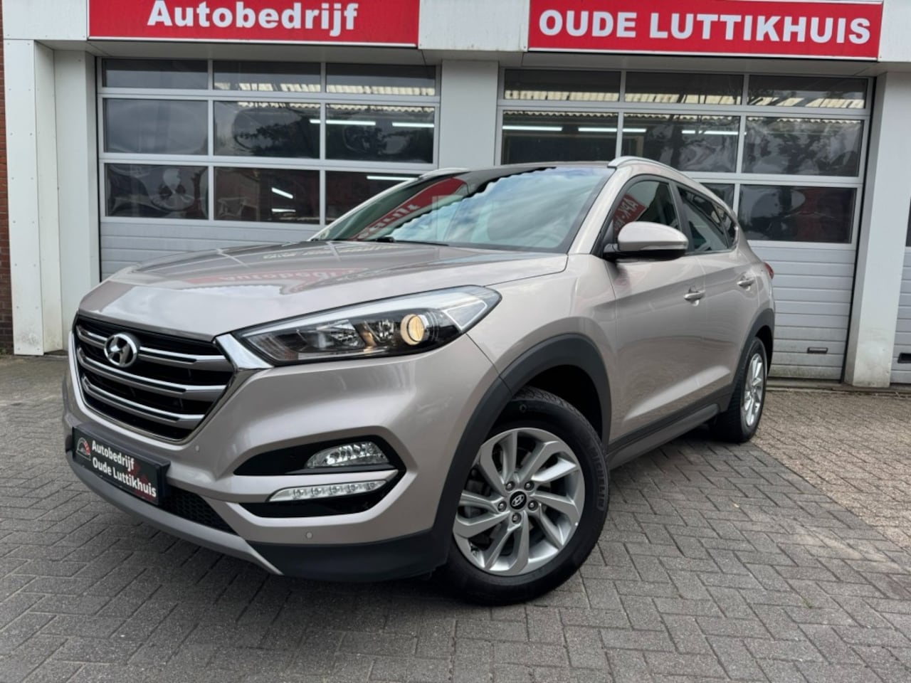 Hyundai Tucson - 1.6 GDi Comfort Cruise Camera Navi Bluetooth Trekhaak - AutoWereld.nl