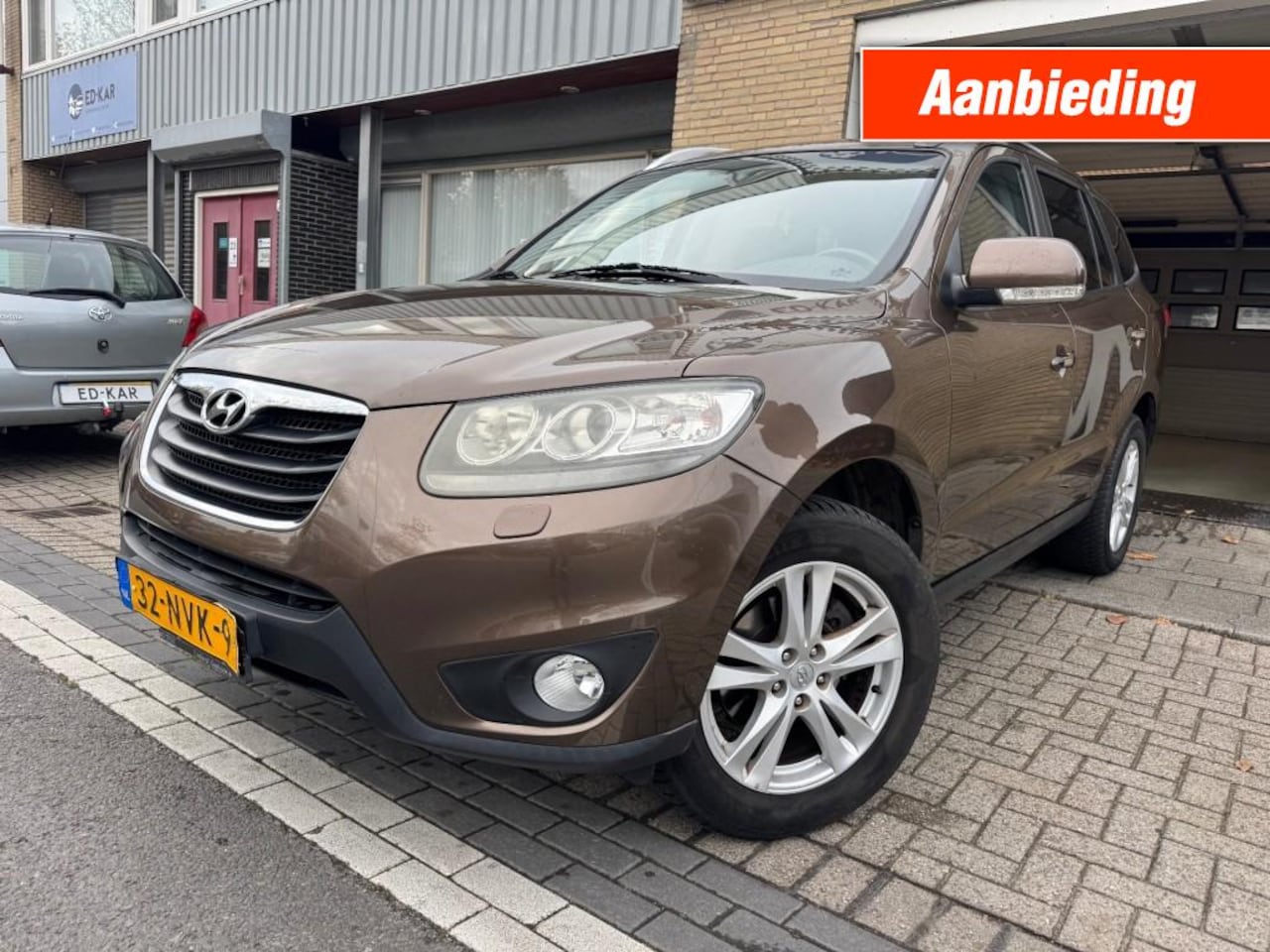 Hyundai Santa Fe - 2.4i CVVT 4WD Style CLIMA LEER DAK NETTE AUTO NAP APK 12-2026 - AutoWereld.nl