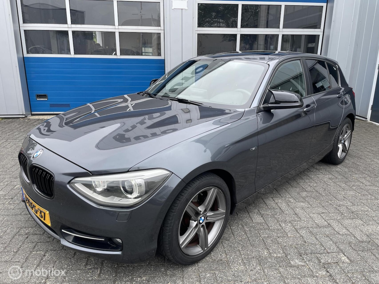 BMW 1-serie - 114i 5D Sport Edition Leer-17''-Xenon-dakje-17'' - AutoWereld.nl