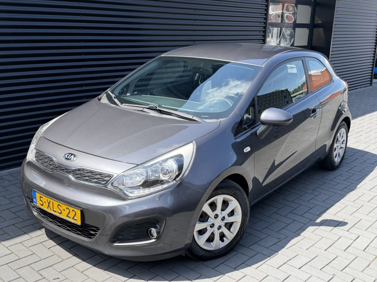 Kia Rio - 1.2 CVVT BusinessLine| CLIMA| CRUISE| NAP| LED| 2015 - AutoWereld.nl