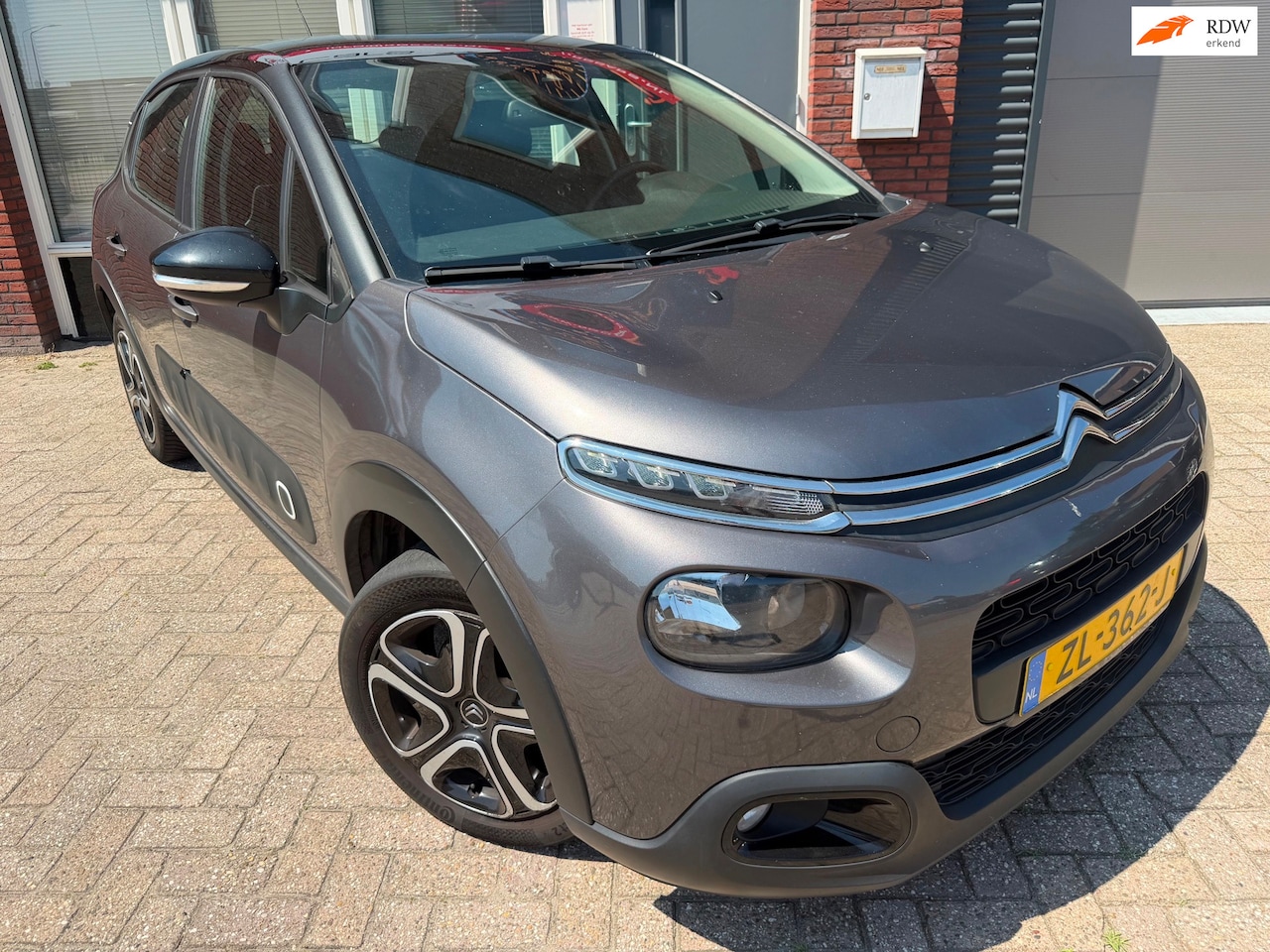 Citroën C3 - 1.2 PureTech Feel Edition / Navi / PDC / Carplay / Cruise / Clima - AutoWereld.nl