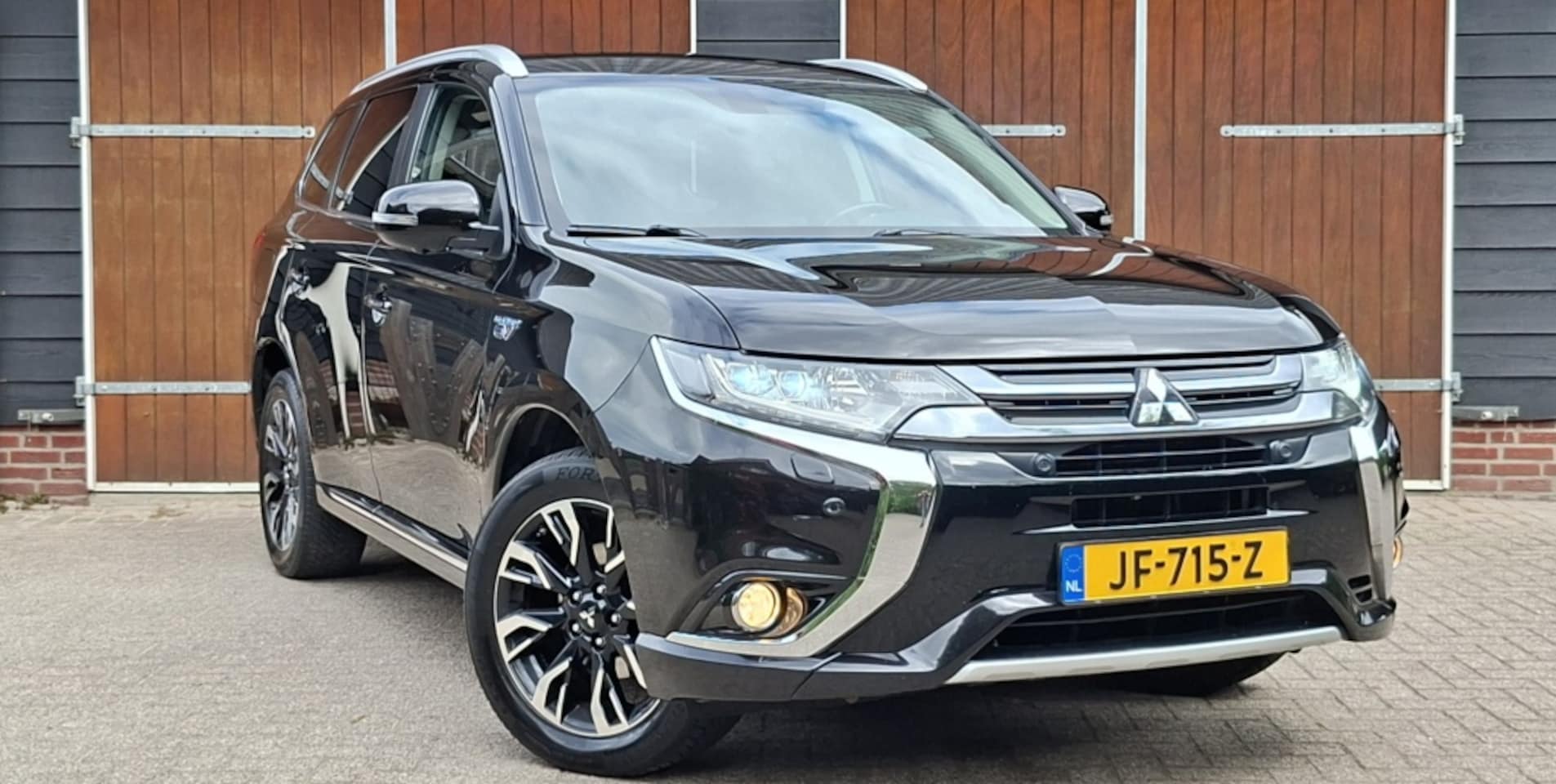 Mitsubishi Outlander - 2.0 PHEV Bns. Ed. | Adaptive Cruise control | Trekhaak | Goed on - AutoWereld.nl