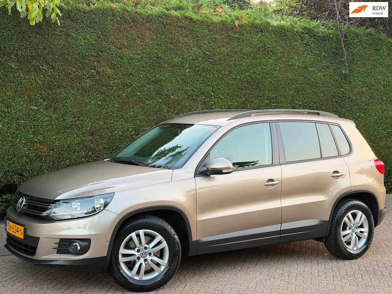Volkswagen Tiguan - 1.4 TSI RIJDSUPER/AIRCO/6BAK/PDC V+A/SVRWN - AutoWereld.nl