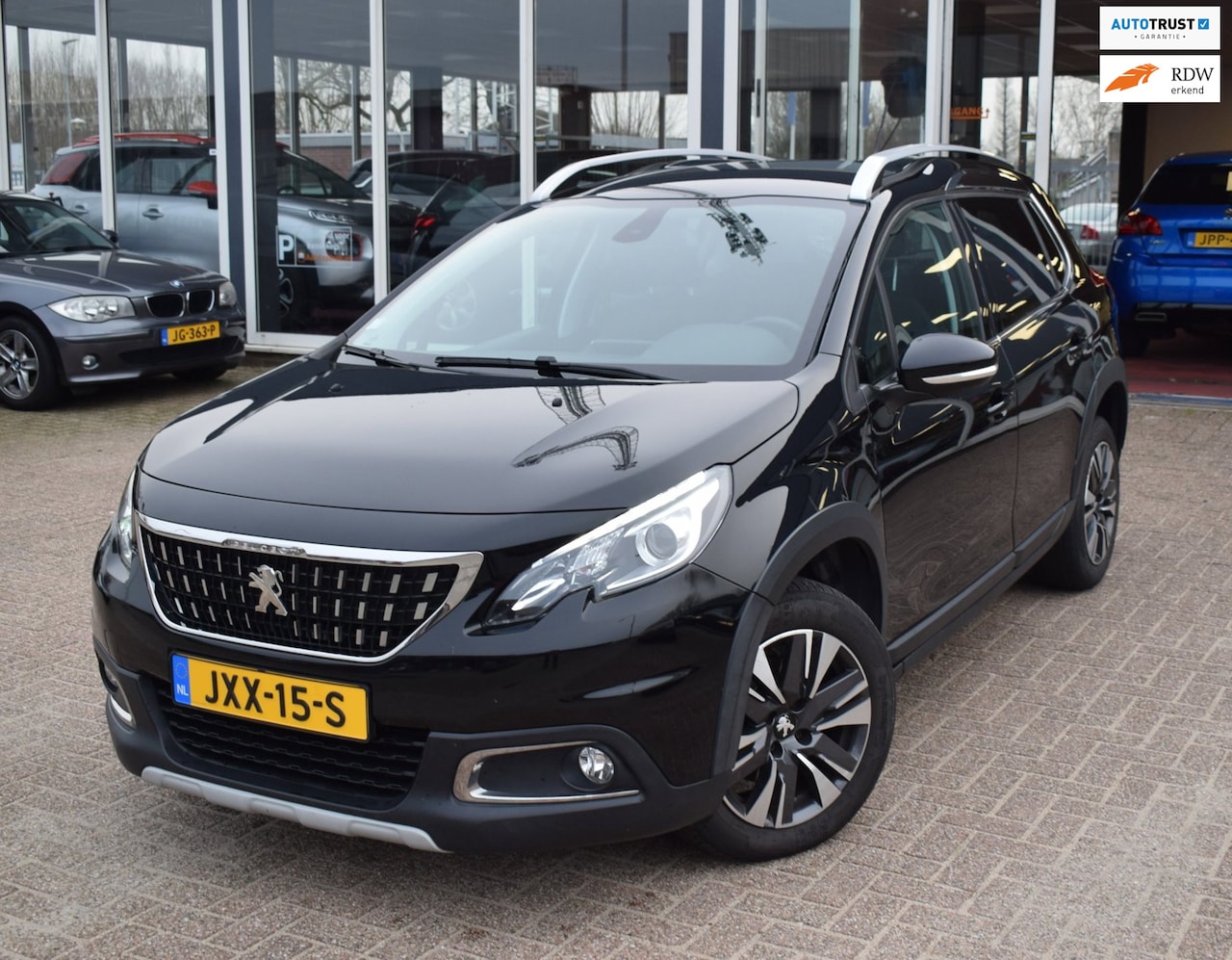 Peugeot 2008 - 1.2 PureTech Allure | NAVI | PARKEERSENSOREN | CLIMATE CONTROL | CRUISE CONTROL | - AutoWereld.nl