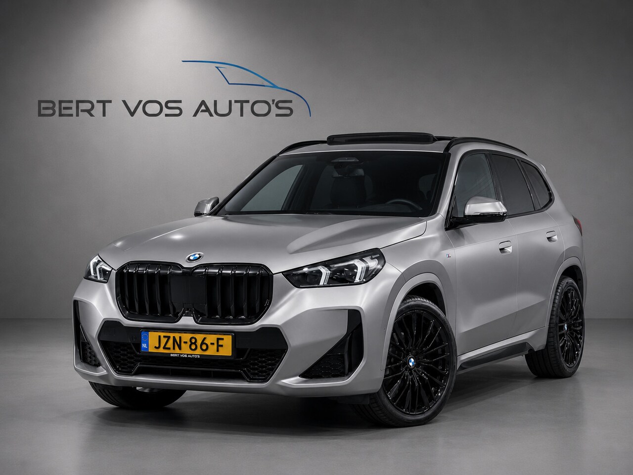 BMW X1 - SDrive18i M Sport Frozen Grey - AutoWereld.nl