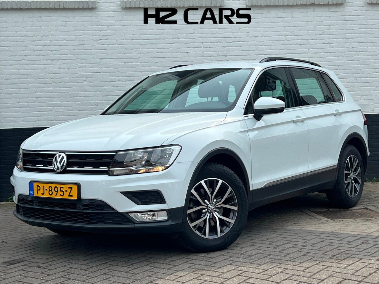 Volkswagen Tiguan - 1.4 TSI ACT Comfortline/Automaat/Trekhaak/Cruise/Airco/LaneAssist/PDC - AutoWereld.nl