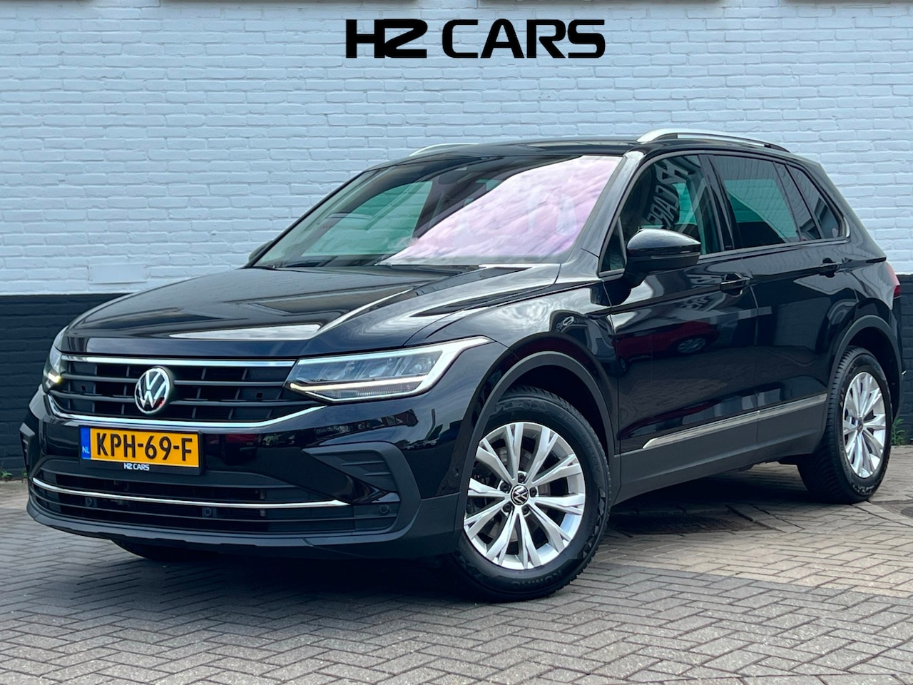 Volkswagen Tiguan - 1.5 TSI Life Camera|Keyless|Massage|ACC|Clima|Parelmoer - AutoWereld.nl