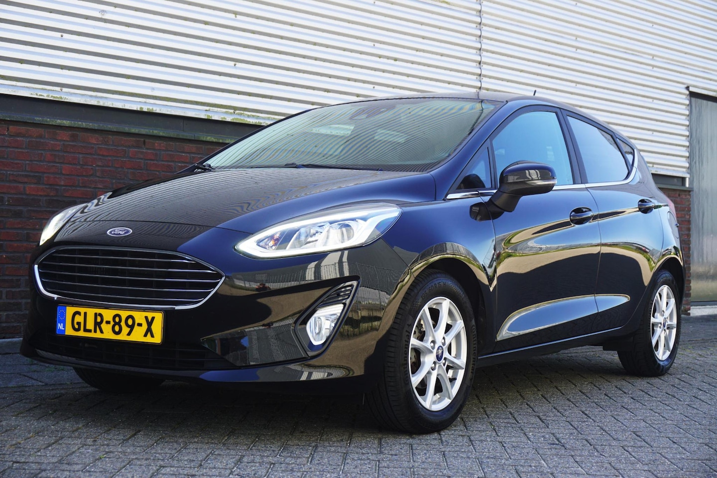 Ford Fiesta - 1.0 EcoB.95PK Titanium X/Navigatie/Apple CarPlay/ Winterpakket/Dealeronderhouden - AutoWereld.nl