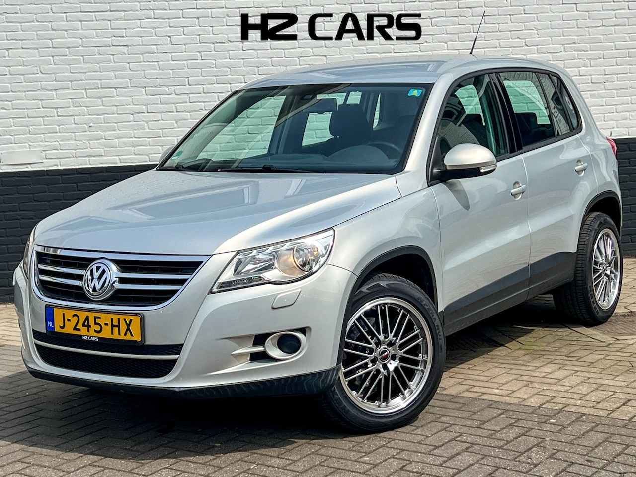Volkswagen Tiguan - 1.4 TSI Trend&Fun/Nieuwe Ketting/18"/Carplay/Clima/Elektr.pakket/Stoelverwarming/PDC - AutoWereld.nl