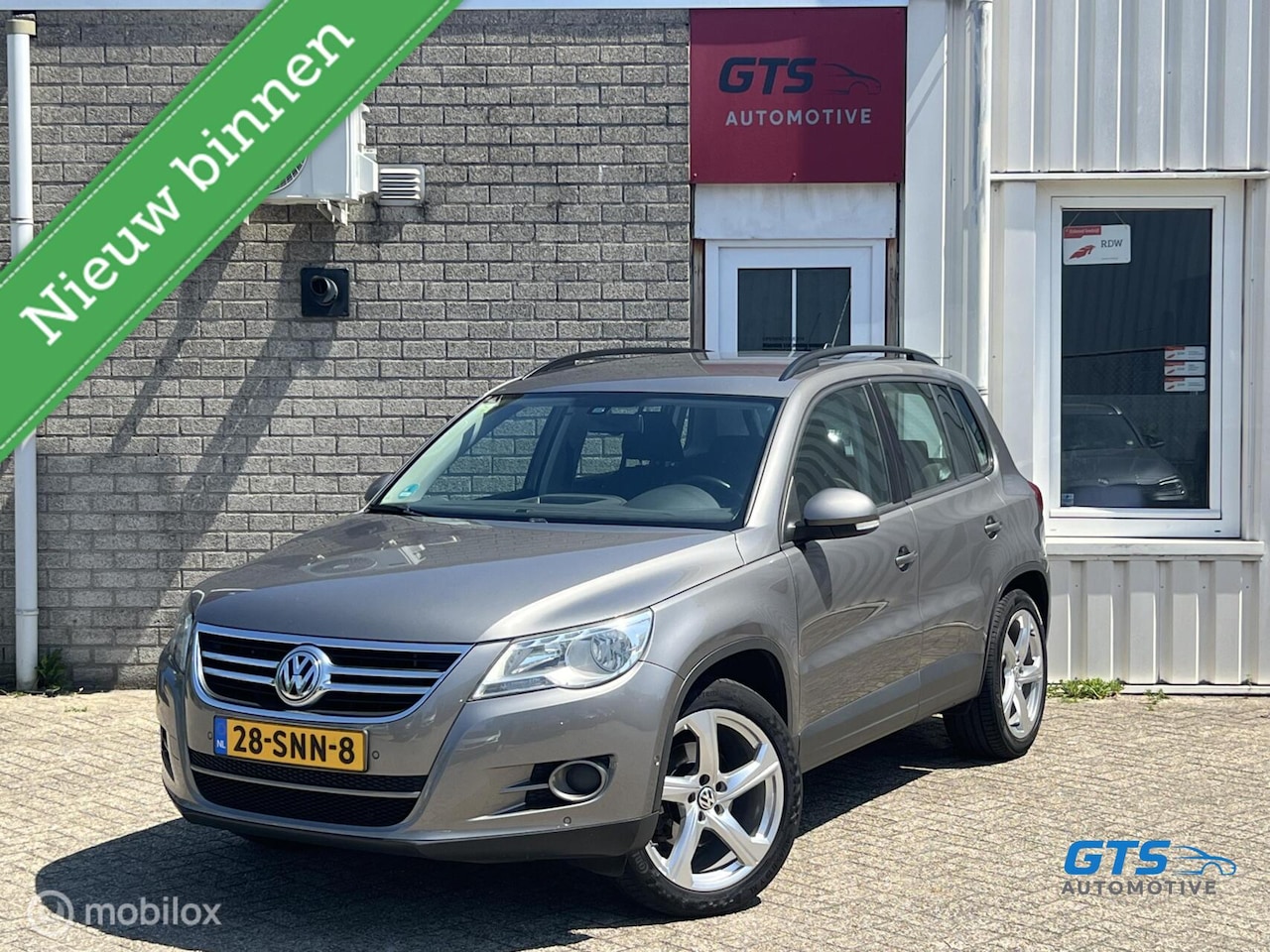 Volkswagen Tiguan - 1.4 TSI Comfort&Design Nw.Distr Kett Trekh - AutoWereld.nl
