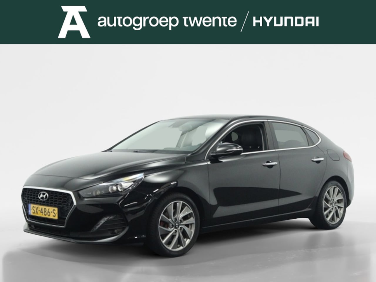 Hyundai i30 Fastback - 1.0 T-GDI Premium | Trekhaak | Navigatie | Camera - AutoWereld.nl