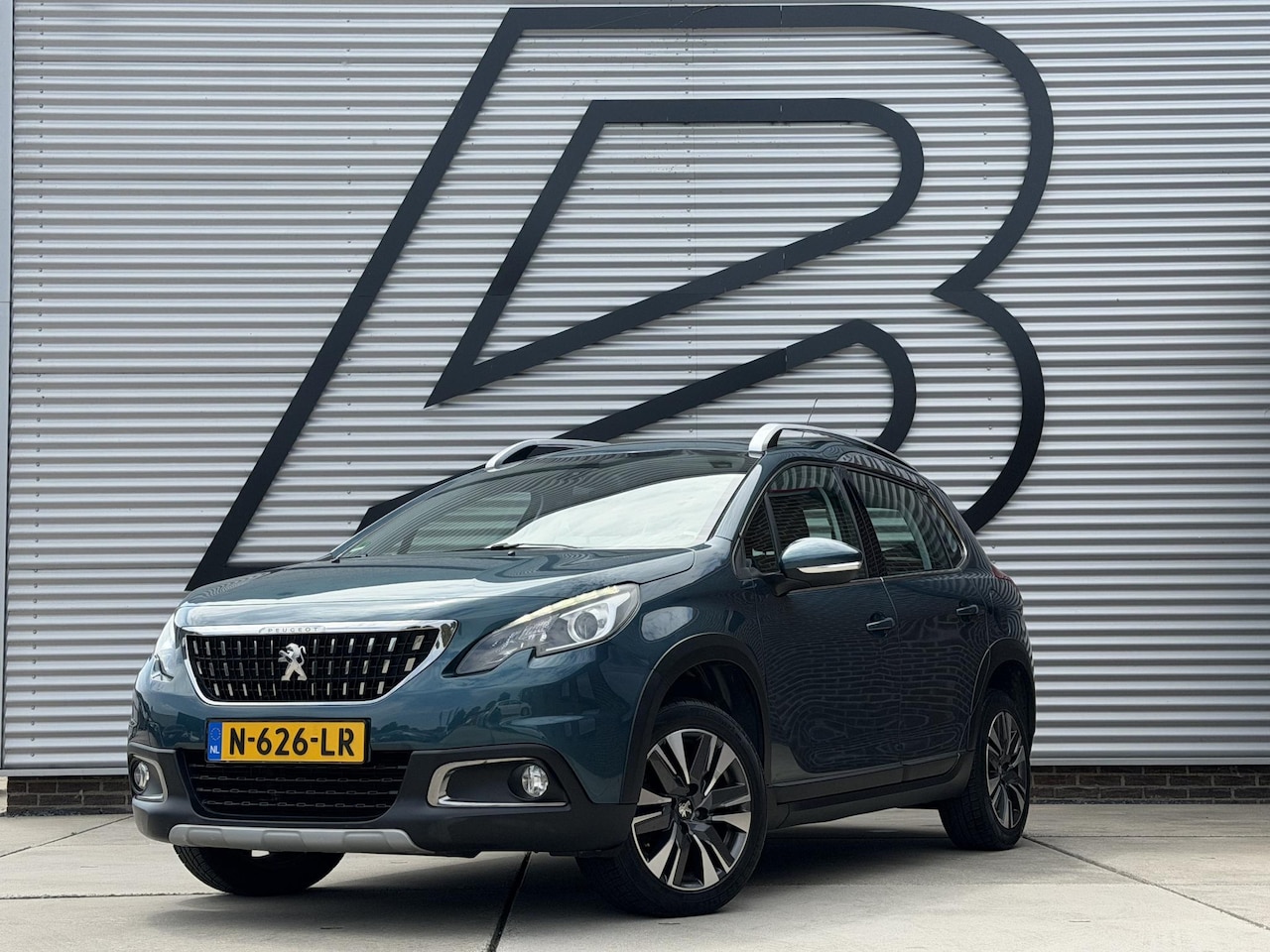 Peugeot 2008 - 1.2 PureTech Allure 2e Eigenaar|Navi|Clima|Trekhaak|Cruise|Stoelverwarming|PDC|APK tot 03- - AutoWereld.nl