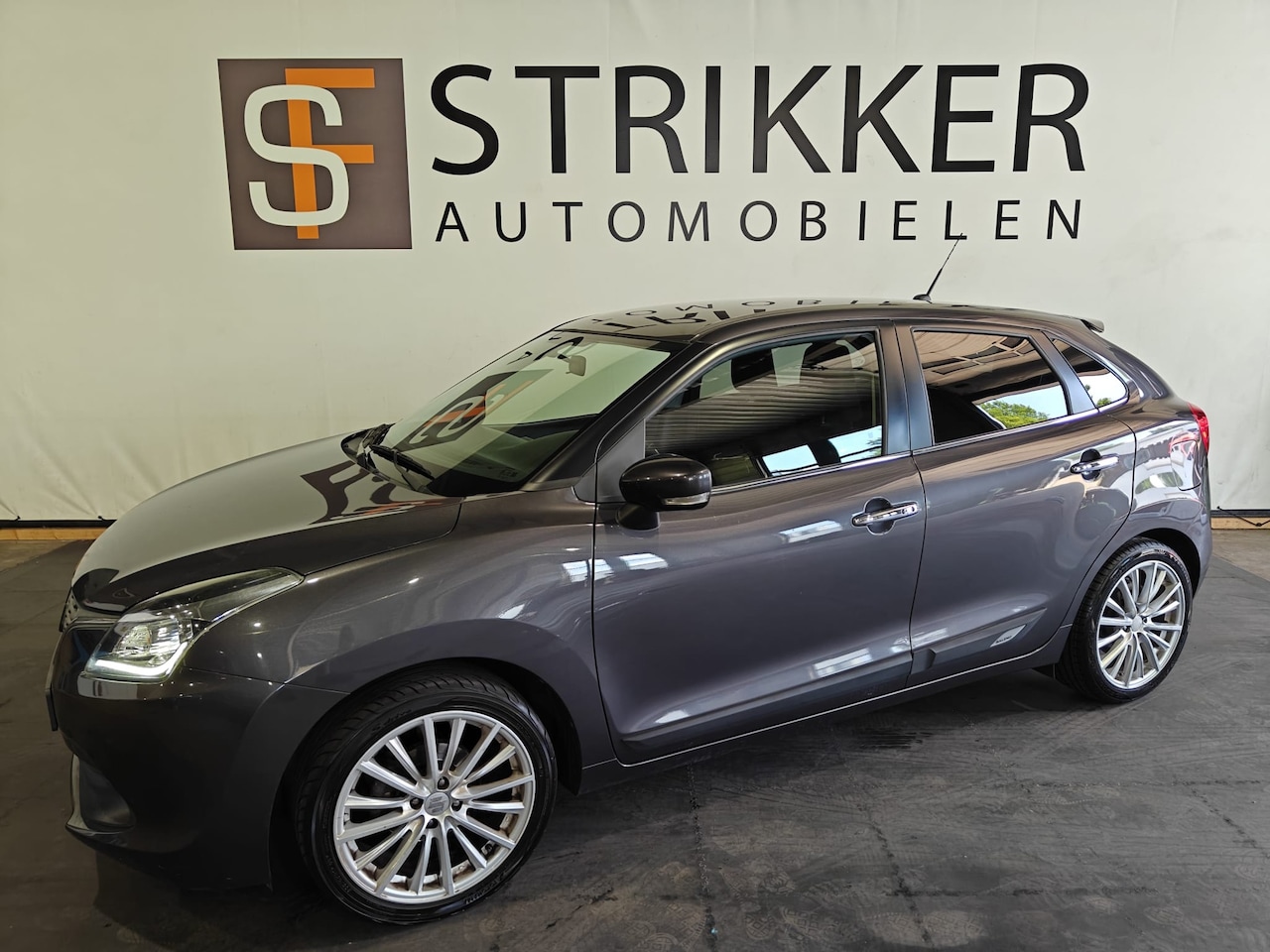 Suzuki Baleno - 1.2 Smart Hybrid High Executive 1.2 Smart Hybrid High Executive - AutoWereld.nl