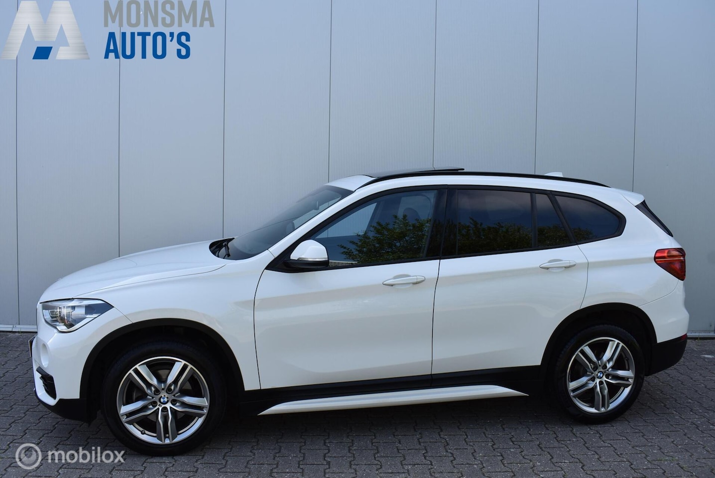 BMW X1 - sDrive18i AUT. Sport Alpinweiss Pano Stoelverw. 18" LMV Privacyglass Nette auto! - AutoWereld.nl