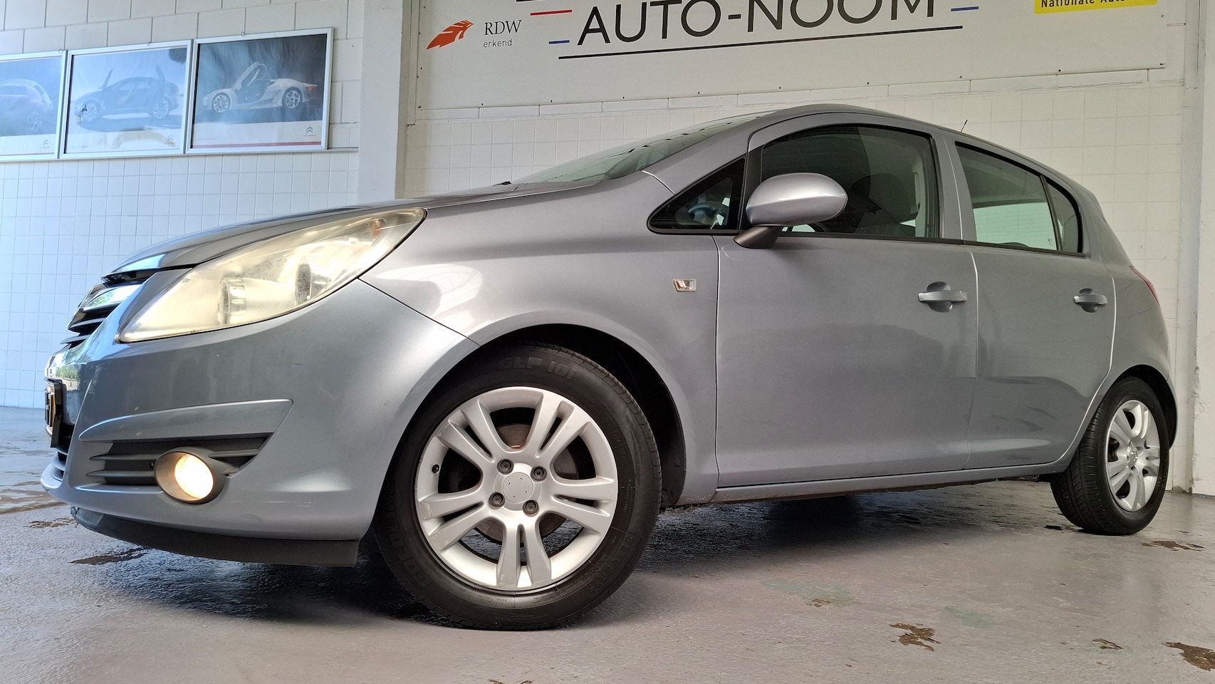 Opel Corsa - 1.4-16V Enjoy NL-AUTO/AIRCO/NAP/LM/LUXE UITVOERING! - AutoWereld.nl