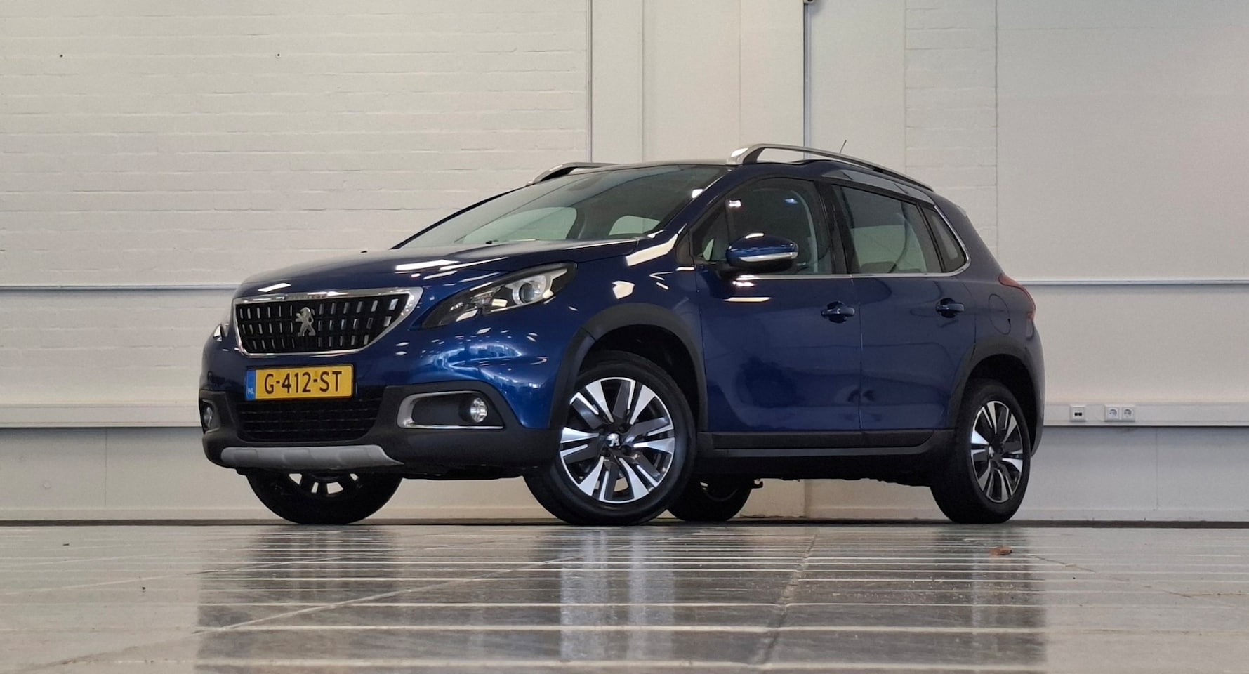 Peugeot 2008 - 1.2 PureTech Allure 1e Eigenaar Pano Camera Trekhaak Mooi! Garantie - AutoWereld.nl