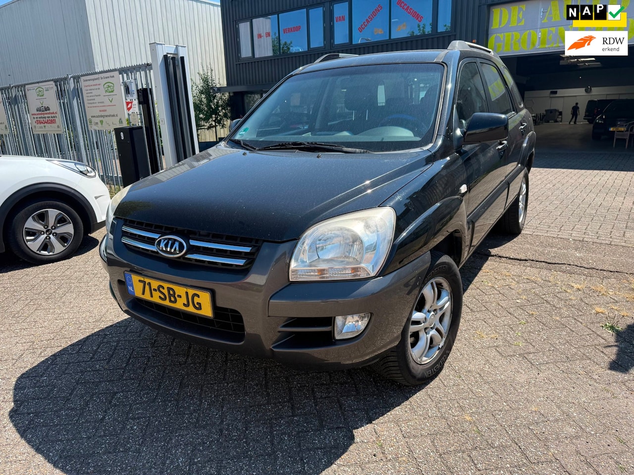 Kia Sportage - 2.0 CVVT Executive 2.0 CVVT Executive - AutoWereld.nl