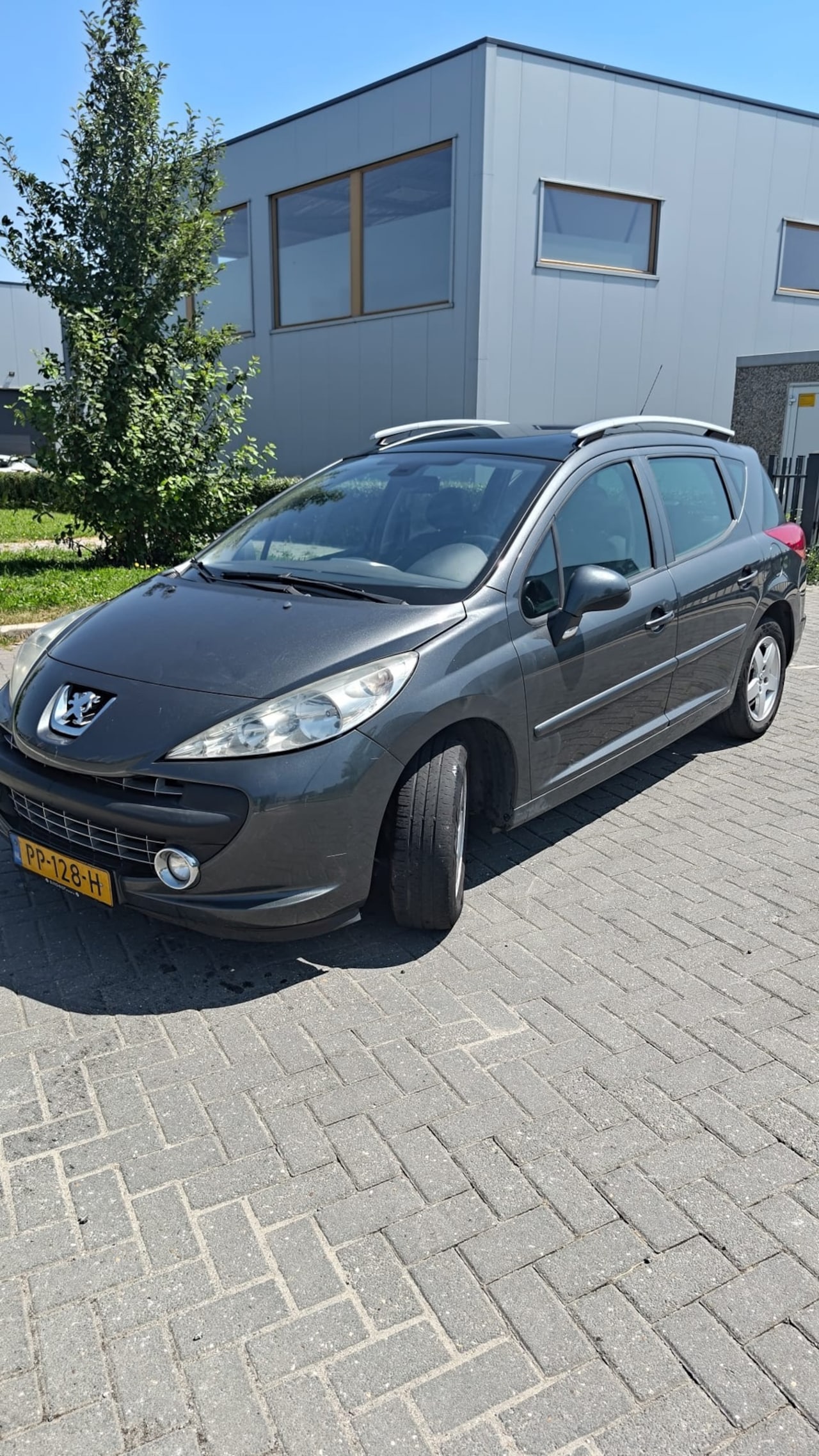 Peugeot 207 SW - 1.4 VTi Blue Lease 1.4 VTi Blue Lease - AutoWereld.nl