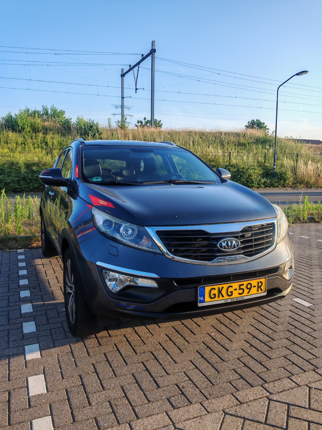Kia Sportage - 2.0 X-clusive 4wd First Edition All power windows, all heated seats, touchscreen, subwoofer, 4x4 - AutoWereld.nl