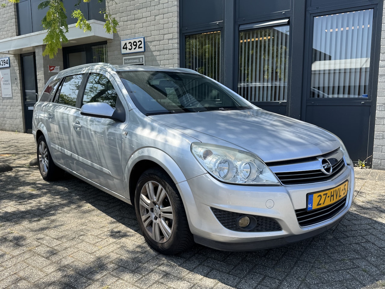 Opel Astra Wagon - 1.6 Cosmo Leder Navi PDC NL Auto 214dkm!! - AutoWereld.nl