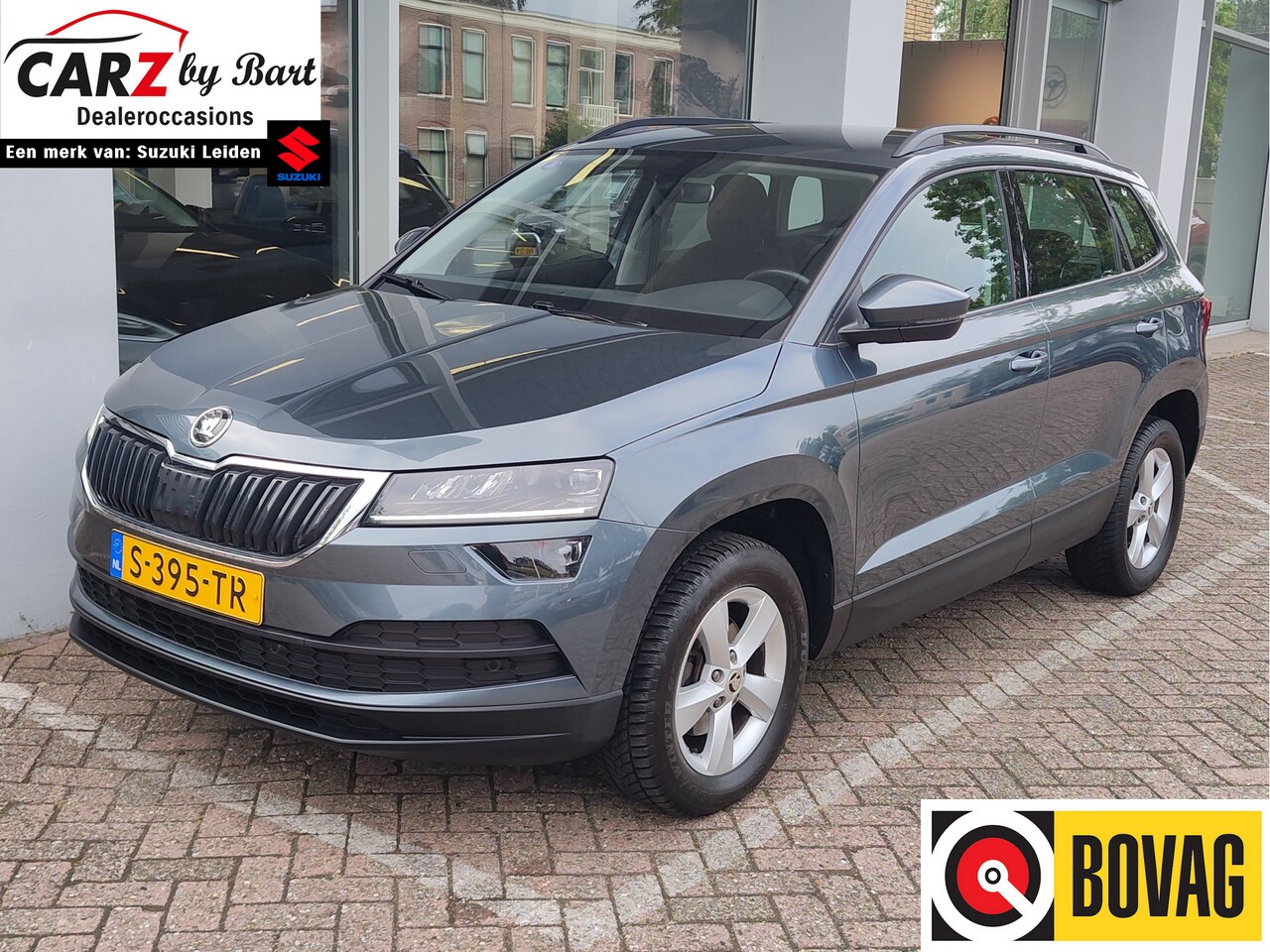 Skoda Karoq - 1.0 TSI AMBITION BUSINESS DSG Navi | Clima | Cruise | Parkeersensoren V+A - AutoWereld.nl