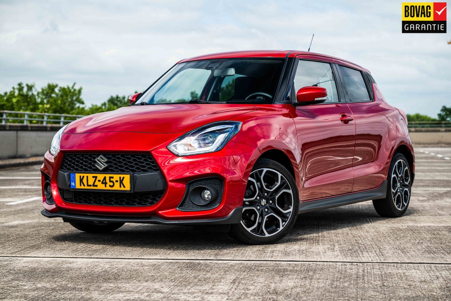 Suzuki Swift - 1.4 Sport Smart Hybrid | Airco/Clima | Adaptive Cruise Control | Camera | Stoelverwarming - AutoWereld.nl