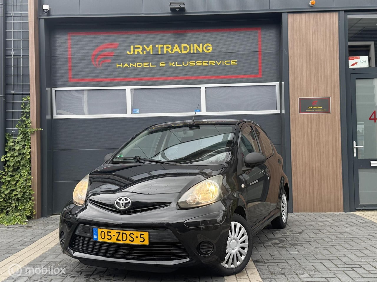 Toyota Aygo - 1.0 VVT-i Comfort zwart 5drs airco NAP lage km stand - AutoWereld.nl