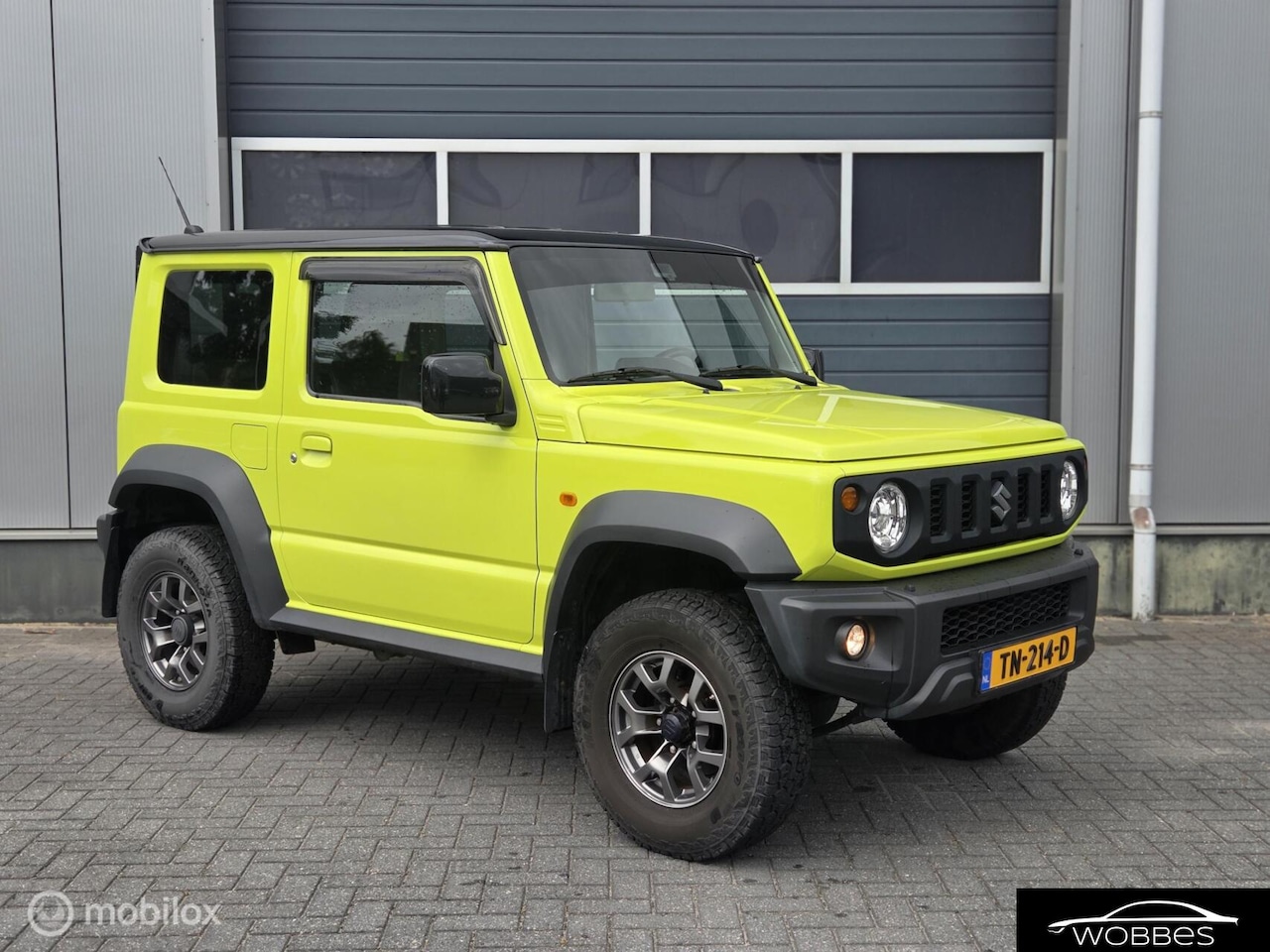 Suzuki Jimny - 1.5 VVT Allgrip Pro Airco/stoelverw/LMV - AutoWereld.nl