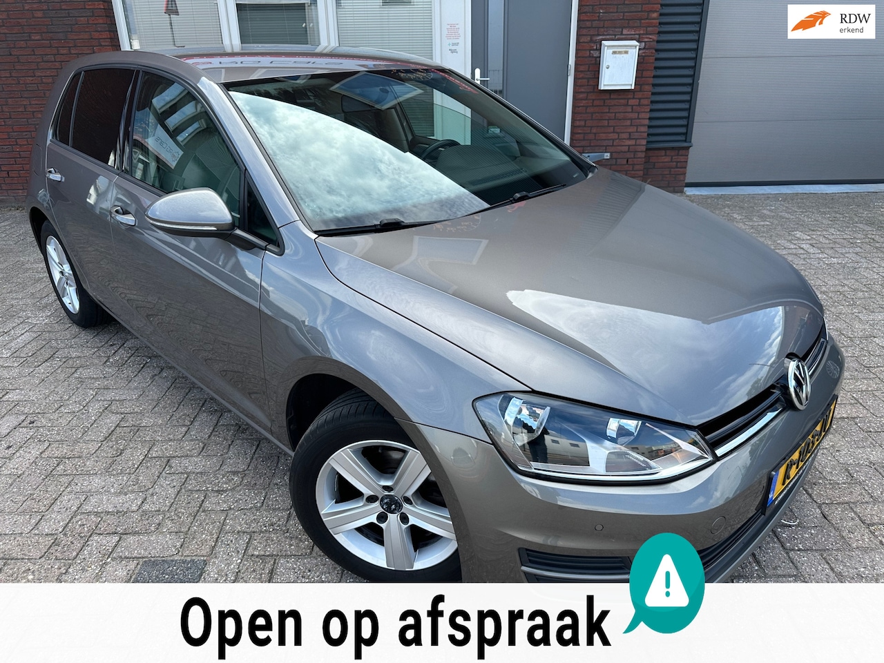 Volkswagen Golf - 1.2 TSI Highline / Navi / Camera / PDC / Clima / Cruise - AutoWereld.nl