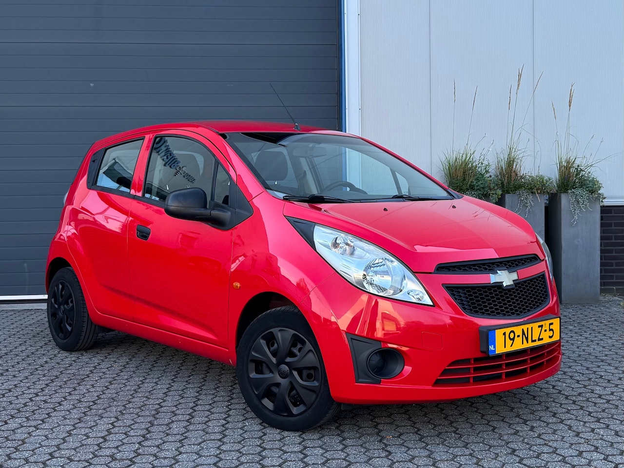 Chevrolet Spark - 1.0 16V L 5-deurs | 1e eigenaar | Nieuwe APK - AutoWereld.nl