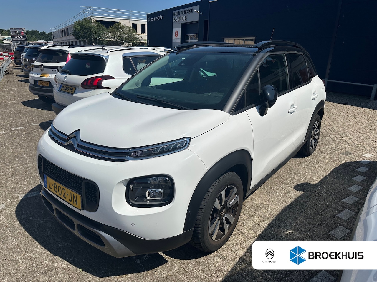 Citroën C3 Aircross - 1.2 PureTech Shine | Navigatie | Camera | Trekhaak | Climate Control | Carplay | Parkeerse - AutoWereld.nl