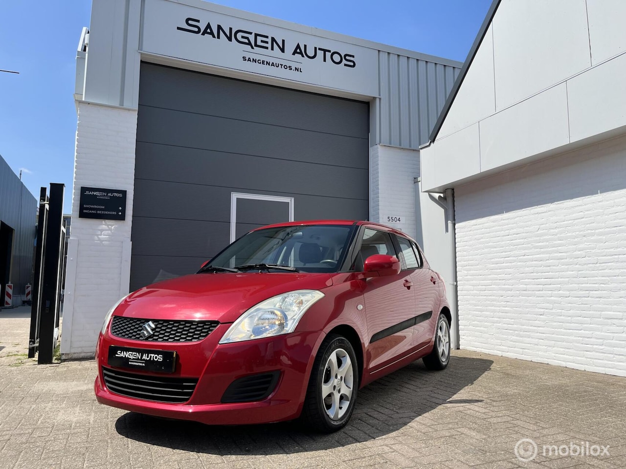 Suzuki Swift - 1.2 Comfort airco stoelverwarming - AutoWereld.nl
