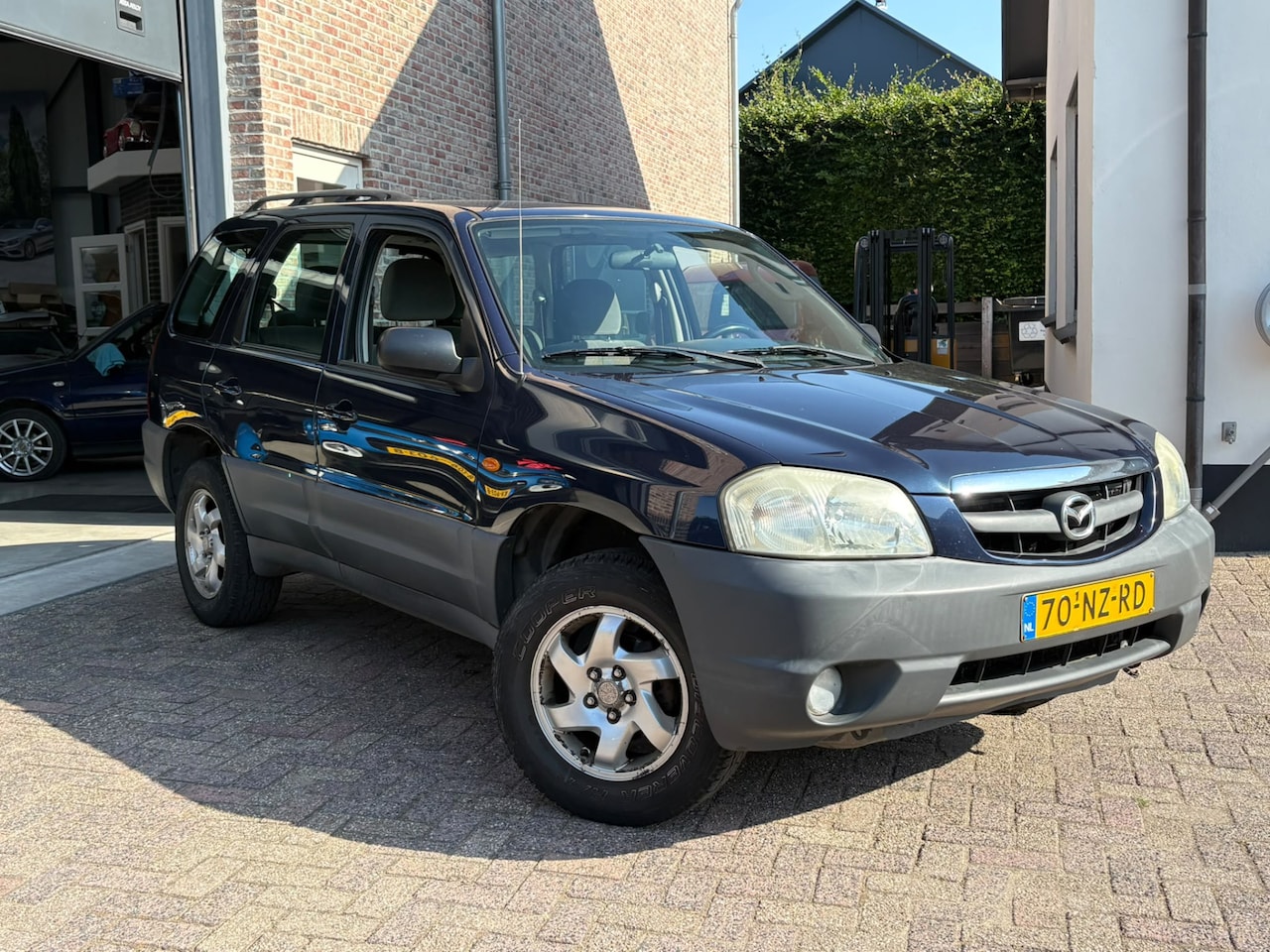 Mazda Tribute - 2.0 Exclusive 4WD Airco inruilkoopje - AutoWereld.nl