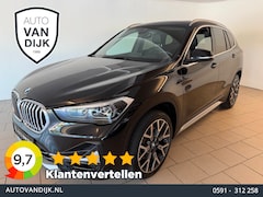BMW X1 - SDrive20i High Executive AIRCO CLIMA NAVI CRUISE PANO LEER STOELVERW HEAD UP TREKHAAK 1800