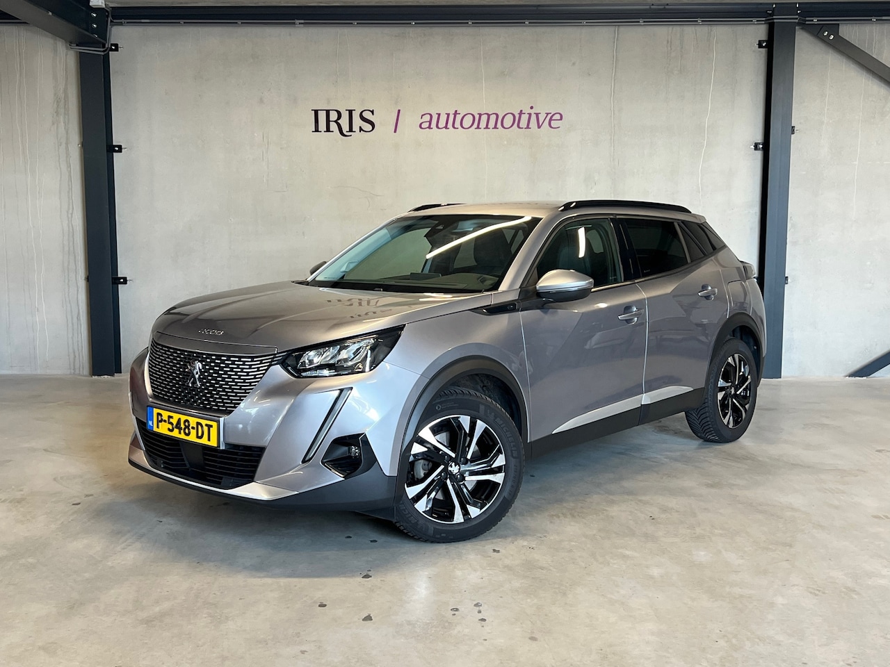 Peugeot e-2008 - Allure 50kwH - SOH 91% - All Season - Apple Carplay - Camera - Keyless - Cr Control - Cl C - AutoWereld.nl
